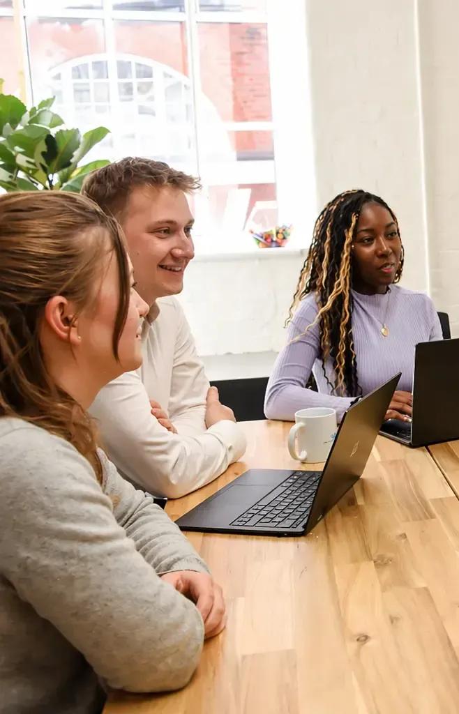 AI Consultants from ADSP collaborating on a new AI project in the London Office