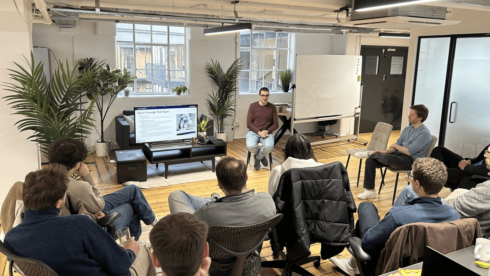 AI strategy consulting workshop at ADSP office led by Head of Data Science Jonny Davis, engaging stakeholders in planning AI initiatives.
