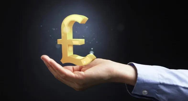 Hand holding glowing pound symbol representing value from price optimisation